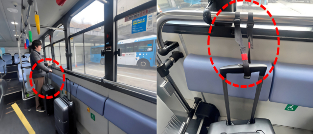 부산시는 다음 달 1일부터 시내버스 85번 12대에 30인치 이하 대형 캐리어 반입을 허용해 시범 운행한다. 붉은 선은 캐리어 고정 예시. 부산시 제공