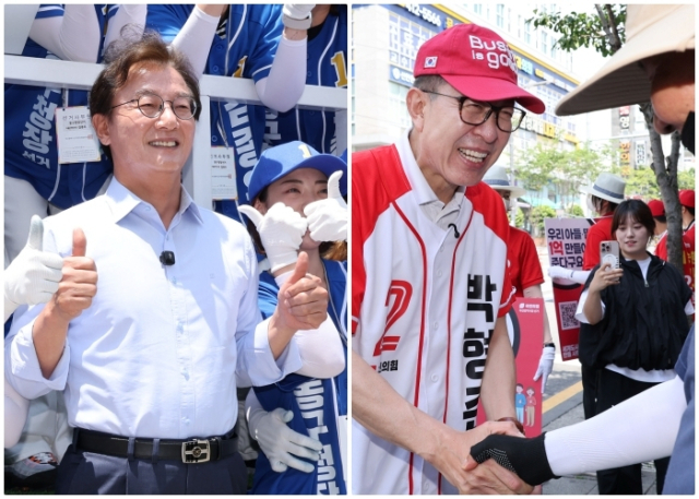 더불어민주당 전재수 후보가 1일 오후 부산 동구 범일동에서 지지자들과 기념사진을 찍고 있다. 같은날 국민의힘 박형준 부산시장 후보가 부산 영도구 봉래시장 인근에서 지지를 호소하고 있다. 정종회 기자 jjh@